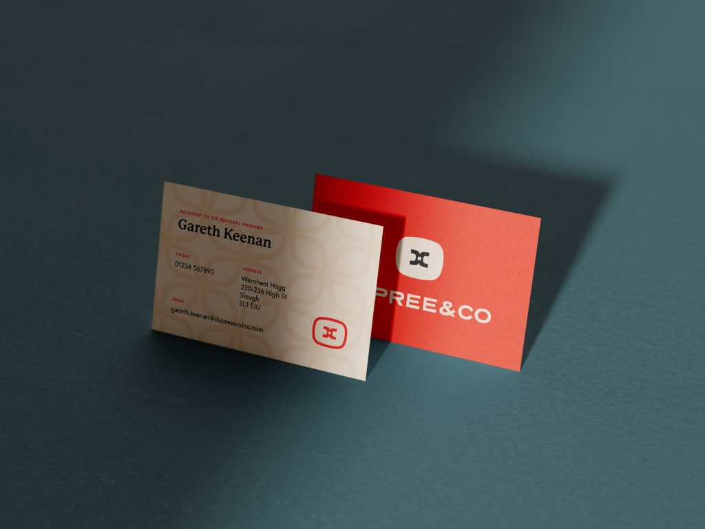 a presentation of two business cards showing the back with a logo, and the front with details